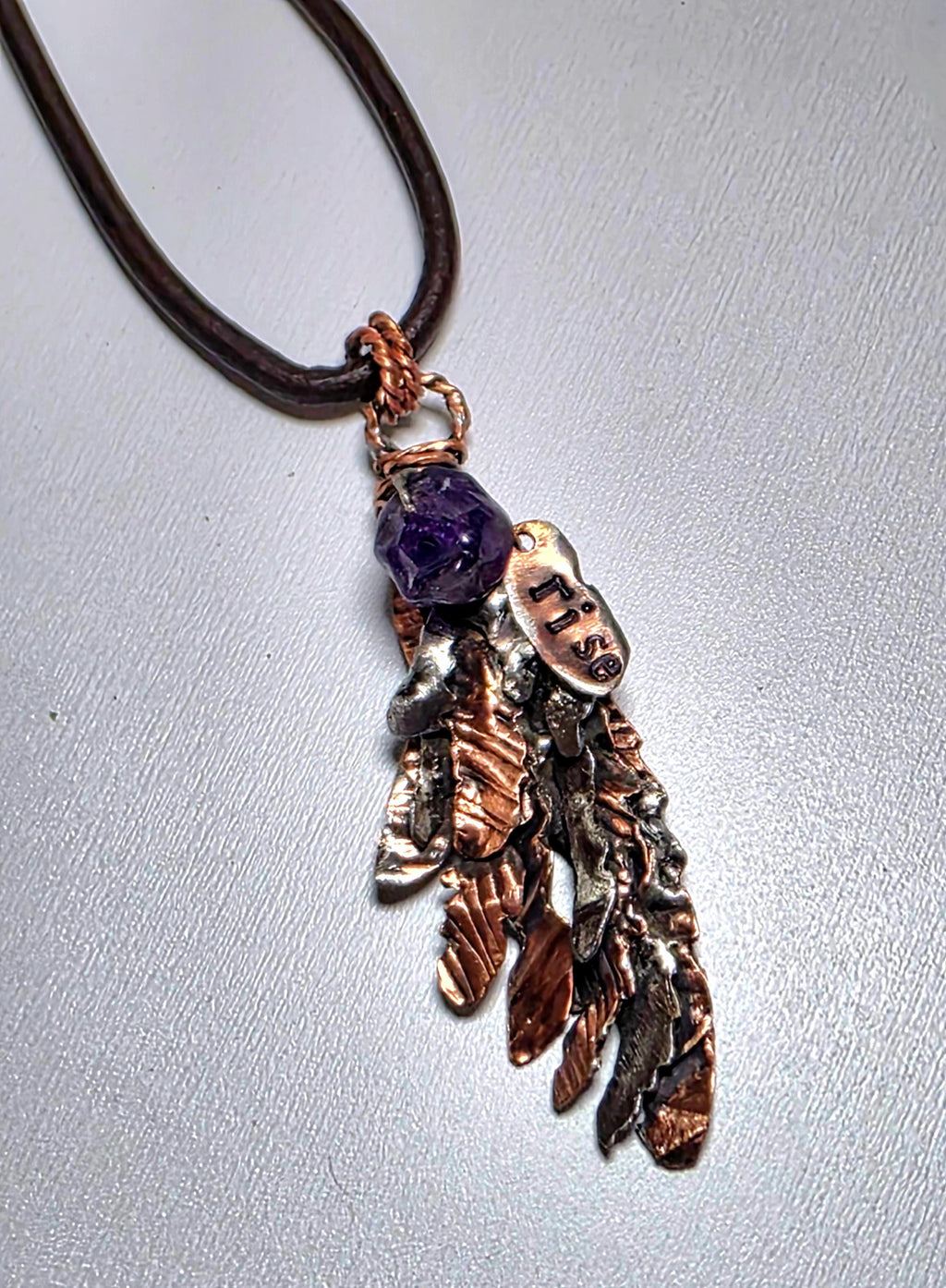 Second Wind Wing Necklace – Hand Forged Copper & Silver Feather Pendant with Amethyst, Rustic Artisan Jewelry, Resurgent Collection