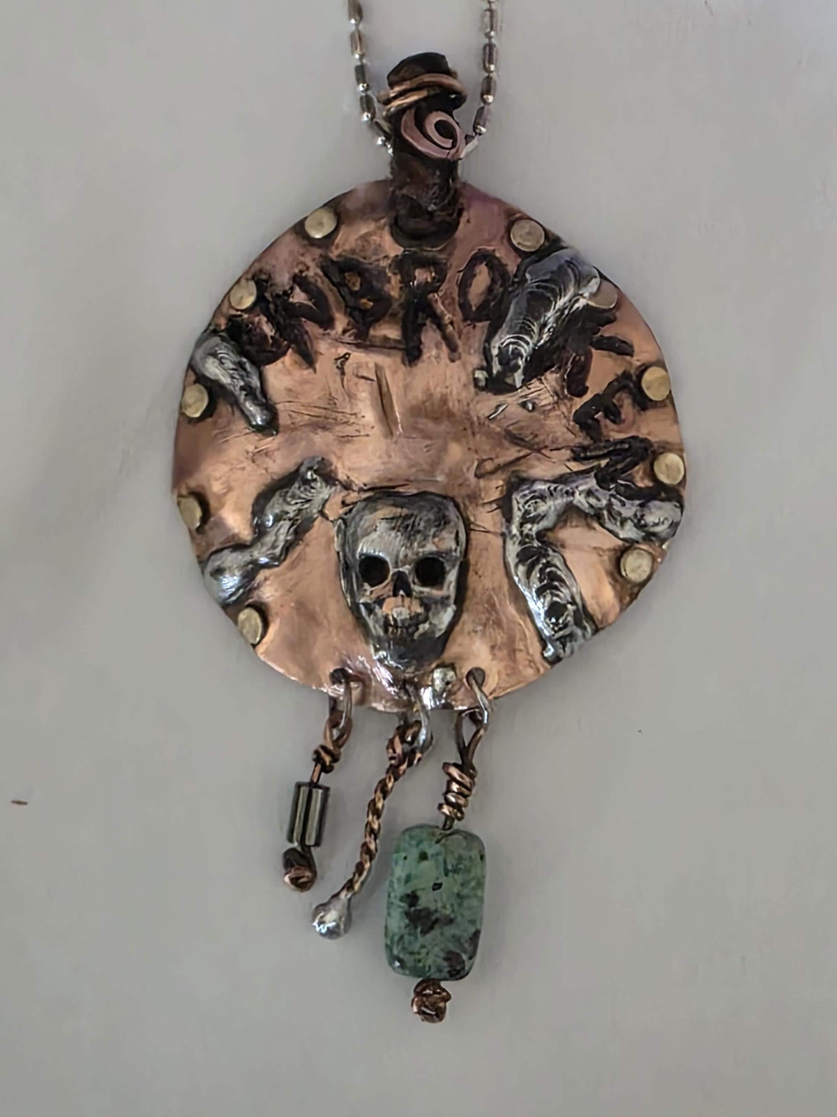 UNBROKEN Skeletons at Our Door Necklace | Handmade Copper Shield Pendant | Skull and Turquoise Survivor Jewelry